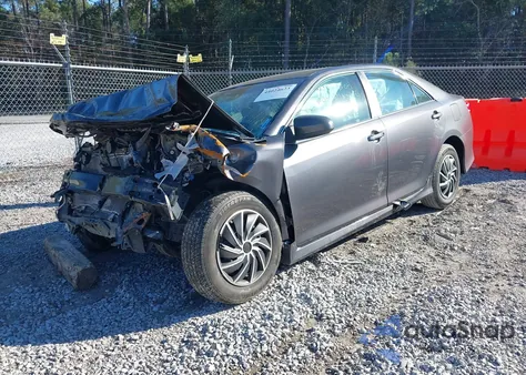 2014 Toyota Camry Le z USA, uszkodzony, nr VIN 4T4BF1FK5ER442957